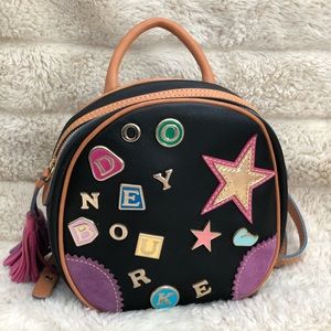 Rooney & Bourke small back pack. W/metal charms
